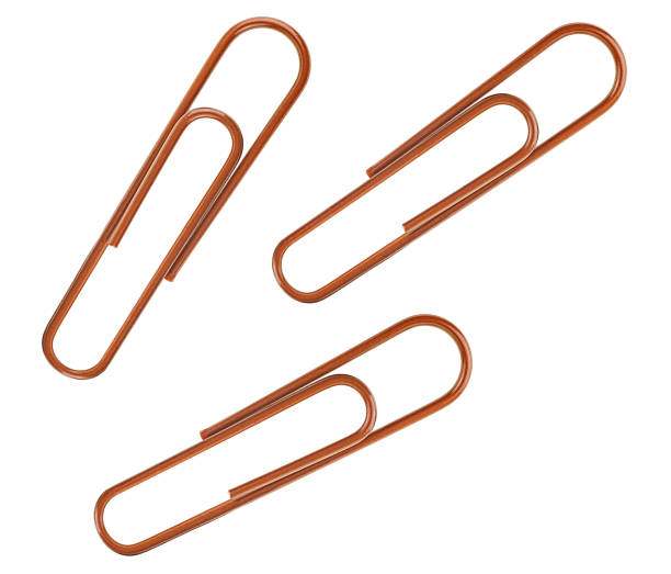 istock Brown paper clips isolated on a white background, top view. 2182884091