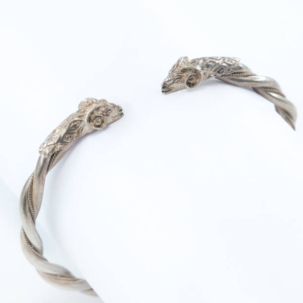 istock A silver bracelet with a horned ram figure 2182886256