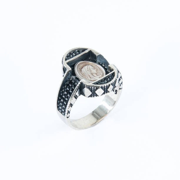 istock An antique silver ring with the Virgin Mary figure 2182886647