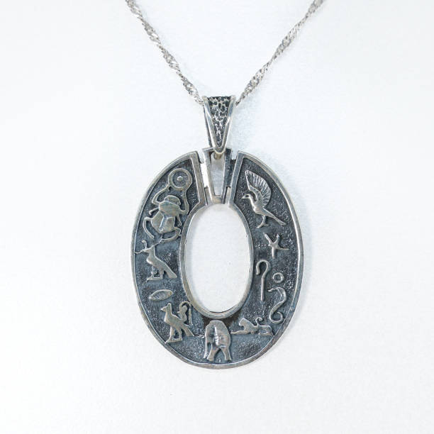 istock A silver necklace decorated with ancient Egyptian figures 2182886847