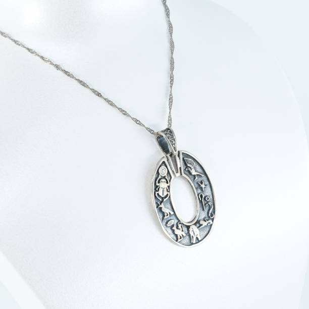 istock A silver necklace decorated with ancient Egyptian figures 2182886932