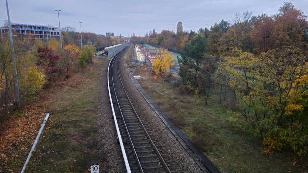 istock Railway tracks amidst autumn foliage 2182890906
