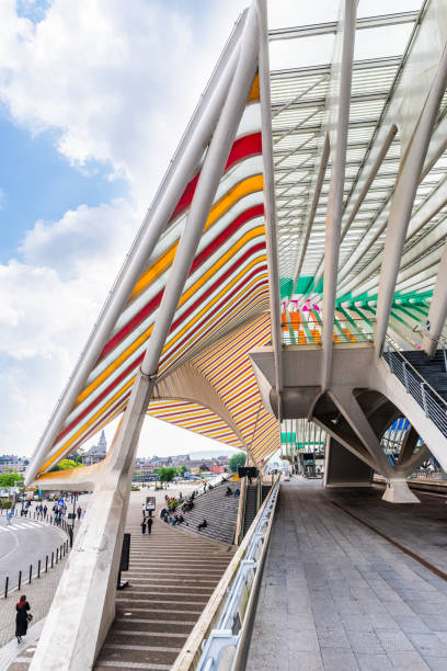 Liege, Belgium - 20.05.2024: Guillemins station with stained glass windows. Station was designed by architect Santiago Calatrava and opened in 2009. Vertical.