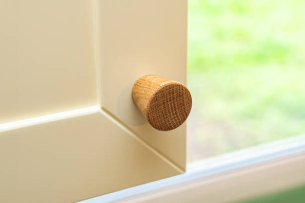 istock Minimalistic wooden handle on modern kitchen cabinet 2182893038