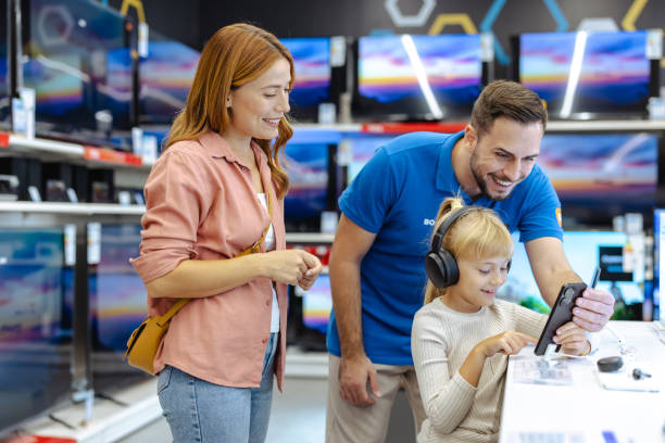 istock Family shopping for electronics at modern retail store 2182894147