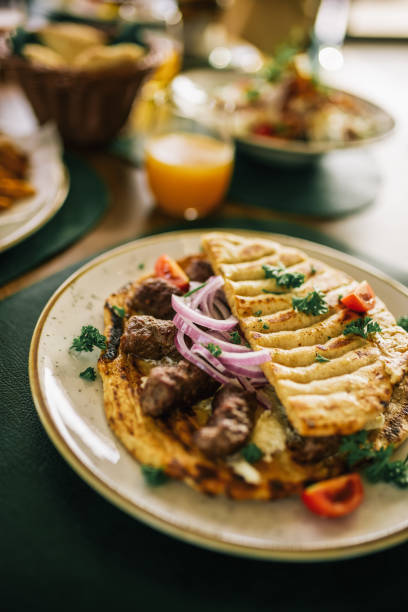 istock Traditional south european sausages cevapi being served in a restaurant. 2182895691