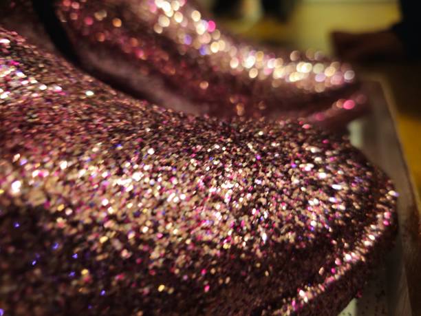 Close-Up of Sparkling Pink Glitter Texture with Bokeh Effect
