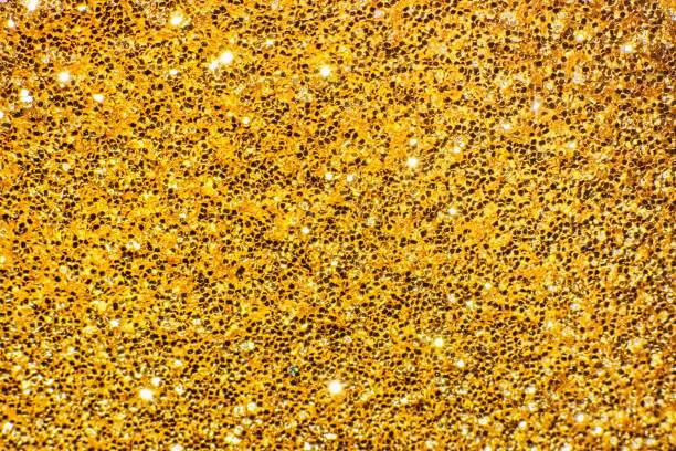 istock Abstract golden glittering background with star dust effect 2182897196