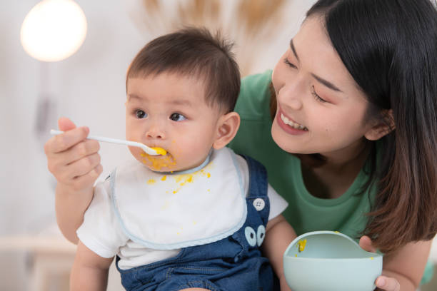 istock Mom and baby's breakfast time 2182897318