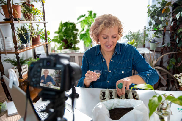 istock Mature woman botanist influencer online 2182905113
