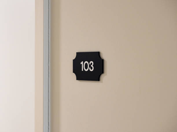 istock Number 103 Sign on a House Wall 2182905774