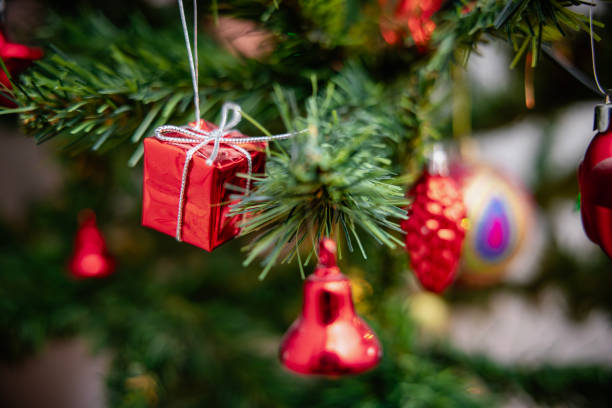 Christmas tree with beautiful decor indoors.