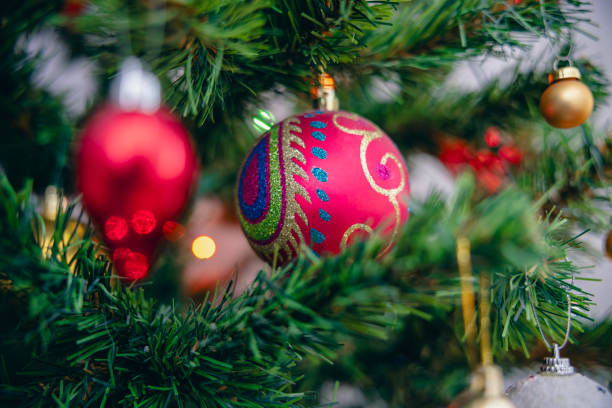 Christmas tree with beautiful decor indoors.