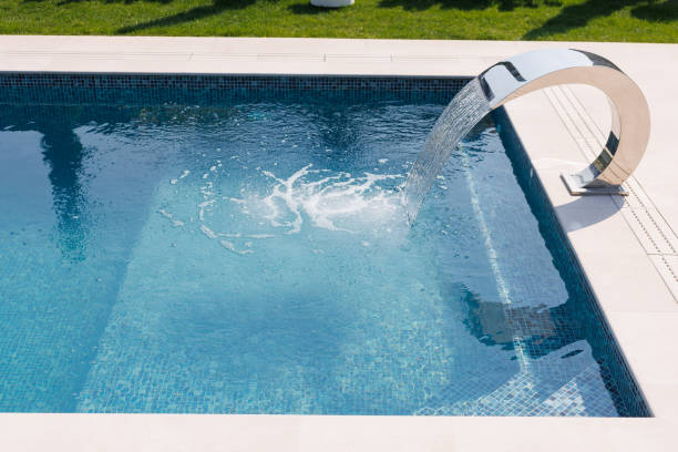 istock Modern Swimming Pool with Curved Water Feature 2182911842