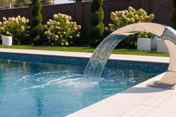 istock Modern Swimming Pool with Curved Water Feature 2182911854