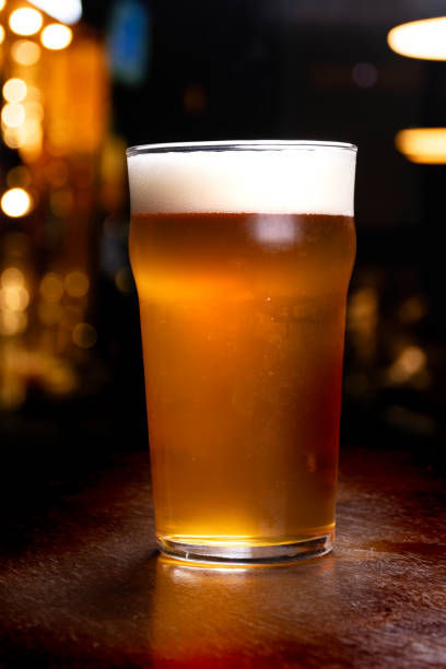 istock pint of pale ale craft beer on blurred pub bar background 2182914033