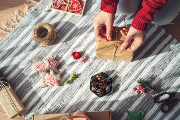 Artful gift wrapping with natural pinecone accents