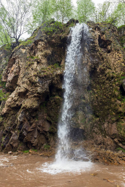 istock Honey waterfalls on a summer day, vertical photography 2182915711