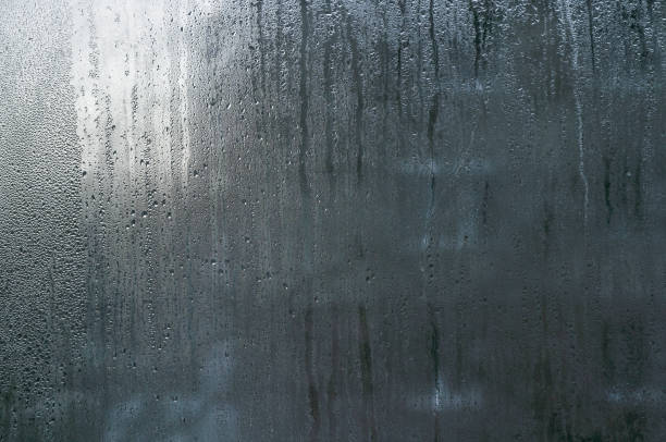 istock condensation on the glass. view from a wet window 2182918811