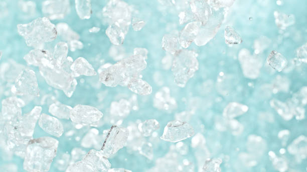 istock Freeze motion of flying crushed ice isolated on blue background. 2182919757