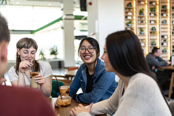istock Young friends have a great time in a cafe 2182919952