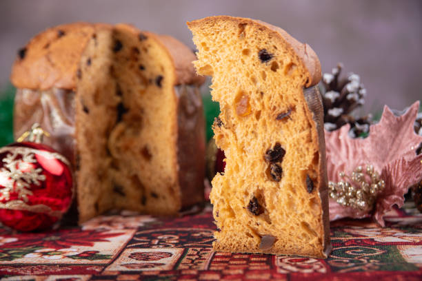 istock Christmas table with panettone, beautiful table decorated with Christmas objects and a delicious panettone, selective focus. 2182921505