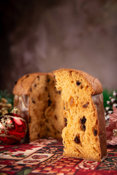 istock Christmas table with panettone, beautiful table decorated with Christmas objects and a delicious panettone, selective focus. 2182921535