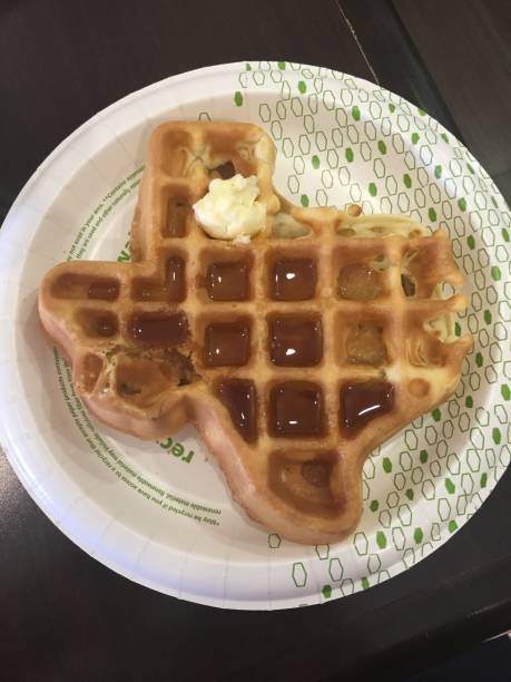 istock Texas-Shaped Waffle with Syrup and Butter 2182928086
