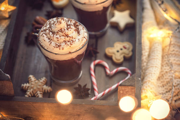 Two cups of hot chocolate with whipped cream for the Christmas holidays