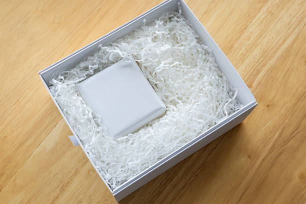 istock Eco friendly white paper wrap for product packaging parcel carton box 2182942321