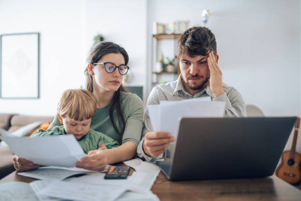istock Family managing budget after paying monthly bills. 2182944379