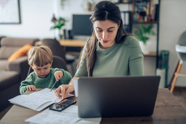 istock Mother checking our family budget. 2182944414