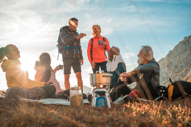 istock Refreshing Tea Time on Hill Summit with Diverse Friends 2182945805