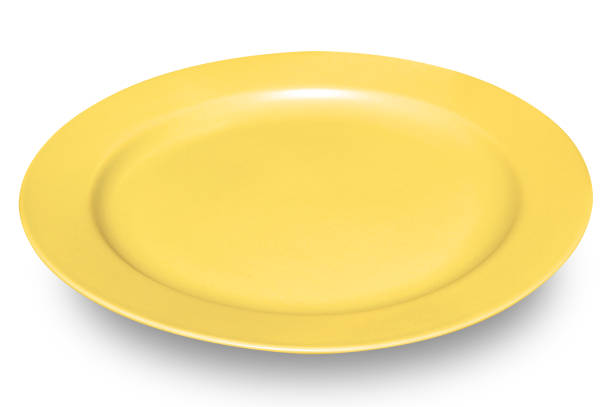 istock Yellow circle ceramics plate isolated on white background. 2182954800