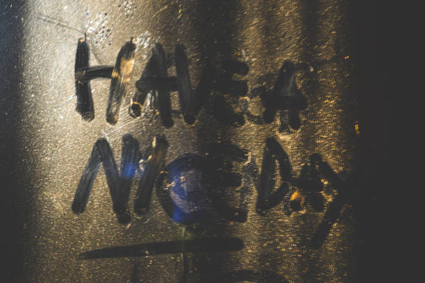 istock A dusty window glass with the words have a nice day written on it. 2182962234