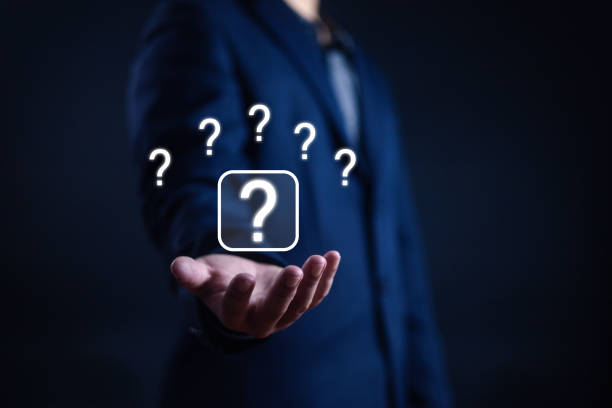 Question mark shows on a palm, Businessman show question mark icon, Technology question concept, FAQ, Wondering questioning and problem-solving, Q and A, ask