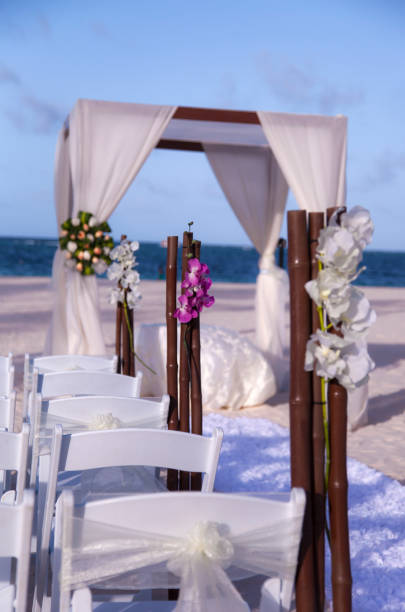 istock Beach wedding ceremony setup with elegant decorations and natural backdrop at sunset 2182967485