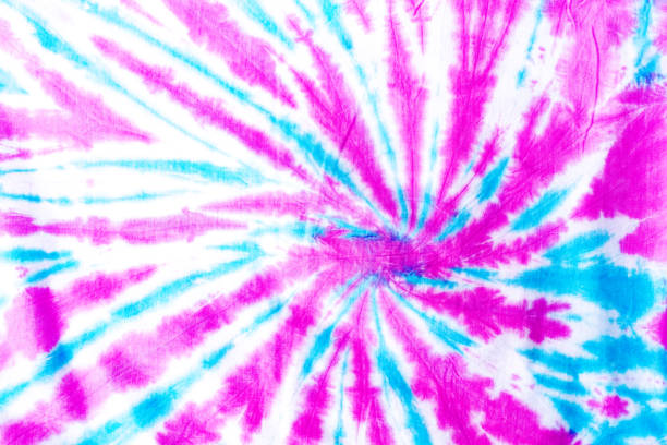 Colorful tie dye spiral pattern on fabric background