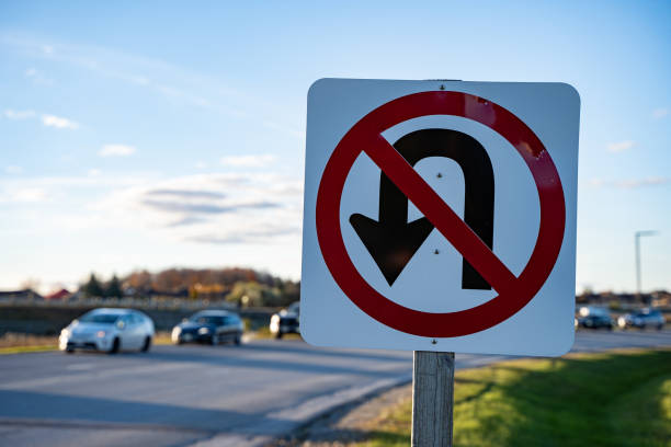 U-turn prohibited sign on the road.