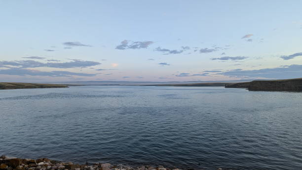 Jensen Reservoir Provincial Creational Area is in Southern Alberta, Canada. Its calm water provides picturesque charm and tranquility to people living by and camping here.