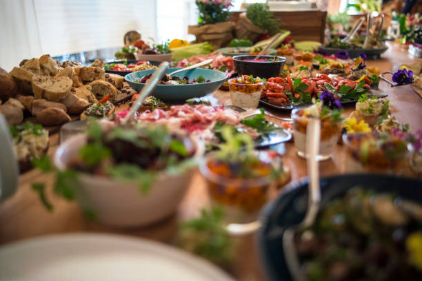 istock A lively summer buffet with fresh salads, breads, and gourmet dishes 2182969106