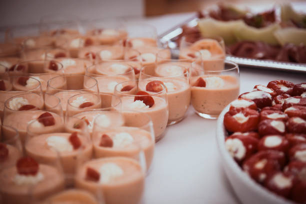 istock Creamy fruit mousse and chocolate-covered strawberries at a delightful dessert spread 2182969206