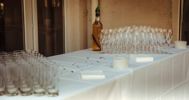 istock Elegant table setting with sparkling glasses and drink bottle at an outdoor event 2182969252