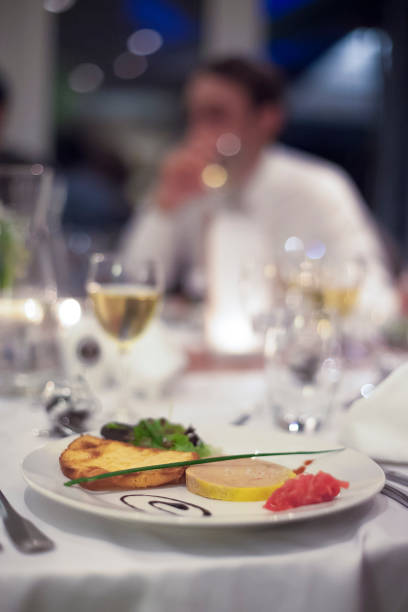 istock Elegant dinner setting featuring gourmet dish and fine dining atmosphere at a restaurant 2182969285