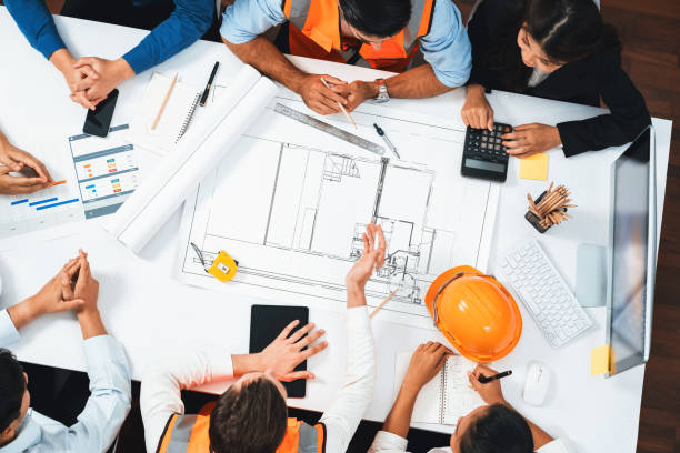 istock Diverse group of civil engineer and client working on architect. Prudent 2182971029
