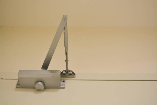 istock Designed for durability, the door closer minimizes noise, creating a calm and controlled environment 2182972588