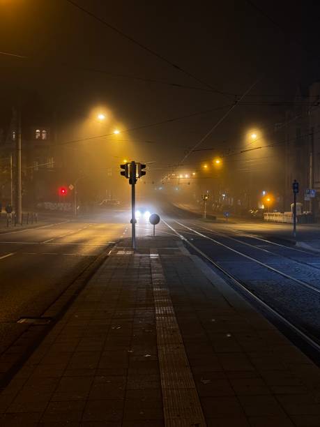 istock street at night with fog 2182974881