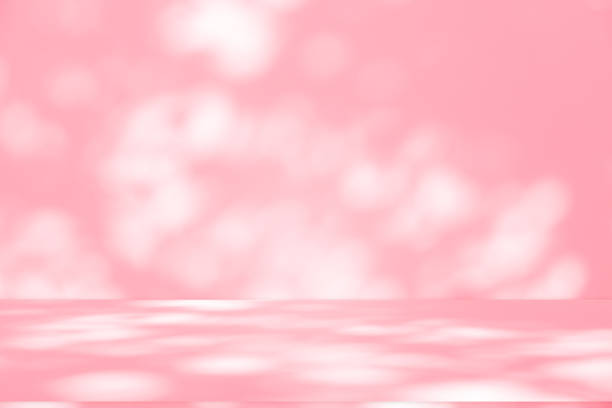 istock Wall interior background, studio, and backdrops show products. with shadow from window color white and pink light. background for text insertion and presentation of product 2182975872