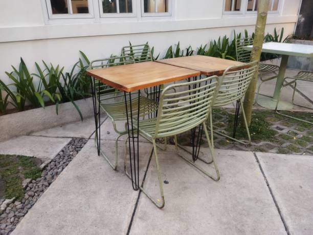 istock vintage table and chairs in a classic cafe 2182977019