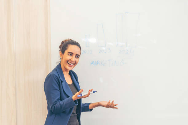 istock Asian business woman working with tablet. 2182981295